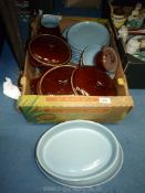 A quantity of Denby china in blue and brown to include; dinner plates, bowls, meat plate,