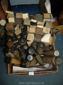 A large quantity of Pianola rolls, some in boxes.