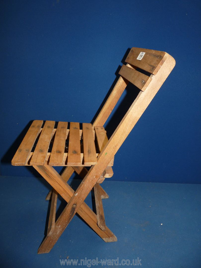 A very appealing child's folding Chair in Beechwood, 21 1/2'' high x 11'' wide. - Image 2 of 2