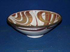 A large pottery Dish with white and terracotta organic leaf pattern,