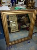 A large gilt plaster framed Mirror, 22 1/2" x 38".