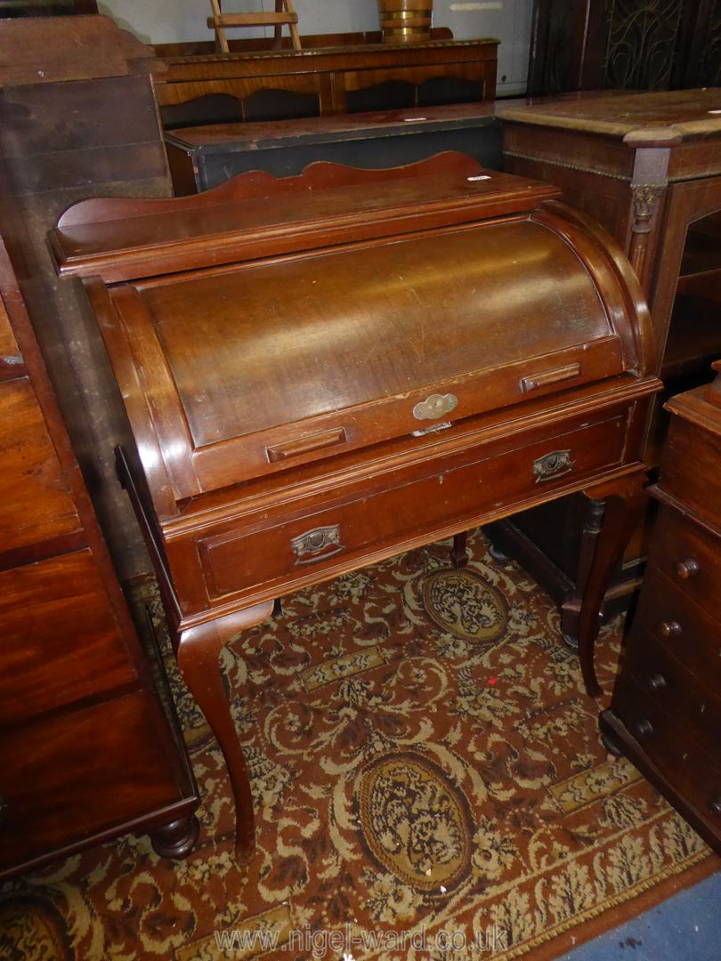An early 20th century Satinwood cylinder topped Bureau, the interior with seven pigeon holes,