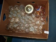 A quantity of glasses mostly etched including pheasant, flowers, etc,