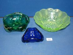 A vintage deco green uranium glass bowl, dark green Murano style dish plus a blue ash tray.