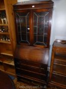 An early/mid 20th century Oak bureau Bookcase,