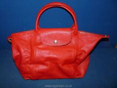 A genuine Longchamp Handbag in red soft metis leather, with removable shoulder strap, Le Pliage,