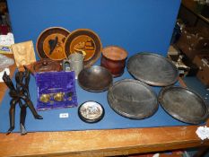 A quantity of treen including bowls, wall plaques, carved flower, container and lid,