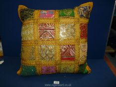 An Indian embroidered sari patchwork Cushion, 24'' x 24''.