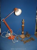A red angle poise lamp by Herbert Terry & Sons Ltd Redditch,