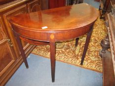 An unusual circa 1900 semi-circular Side Table having light and darkwood strung and cross-banded
