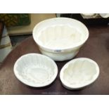 Three china jelly moulds, including a Copeland pineapple jelly mould,