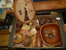 A large box of treen including large bowl, pair of goblets, pair of candlesticks,