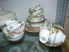 A part 'Diamond china' part tea set with green leaf, rose,