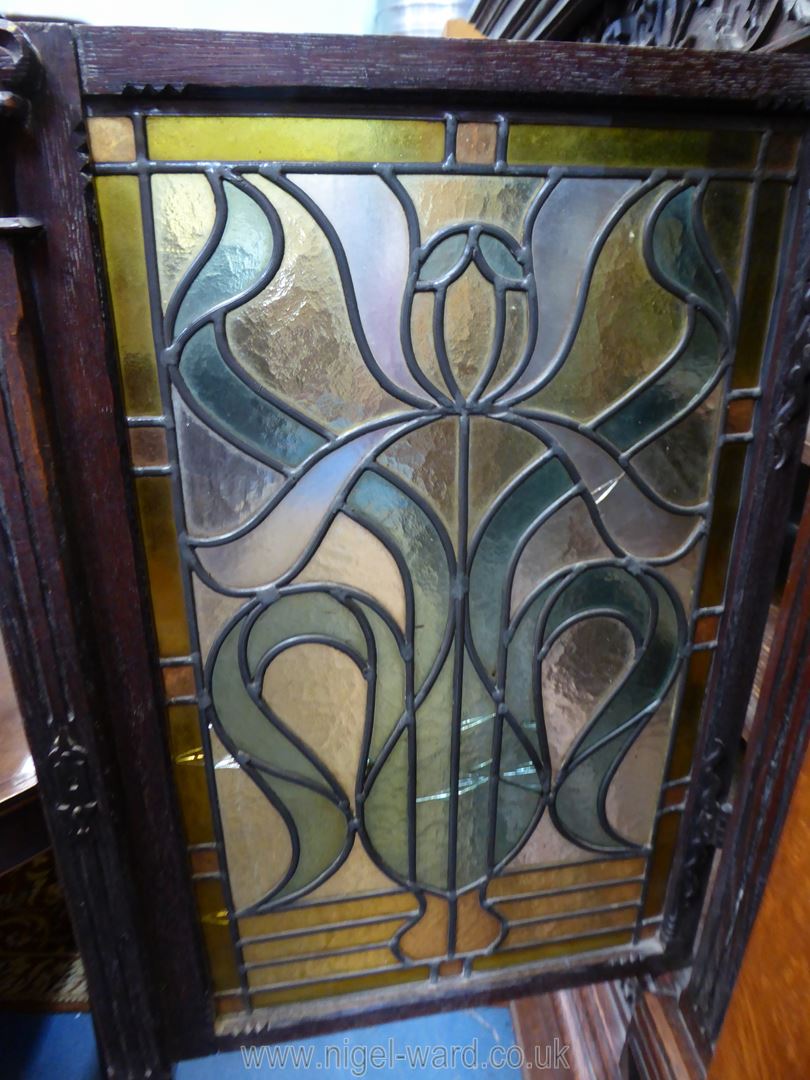 A most unusual Oak Cabinet on stand having a pair of opposing intricately coloured leaded glazed - Image 4 of 5