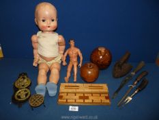 A small quantity of miscellanea to include; an Action Man figure, carving set, flat iron,