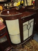 A circa 1930 Mahogany/Walnut china Display Cabinet of good quality having a shaped glazed central