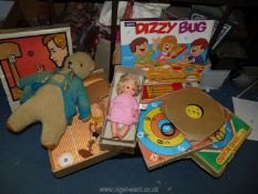 Three 1970's games including Dizzy Bug, Ring Board and Basketball, a Noddy 78 rpm record,