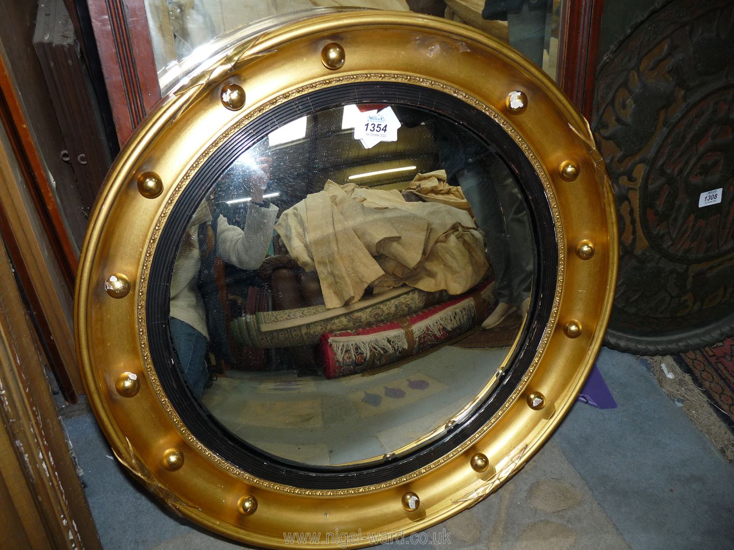 A gilt Convex Mirror, 21'' diameter.