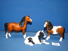 Three John Beswick ponies to include Piebald Vanner pony foal (boxed,