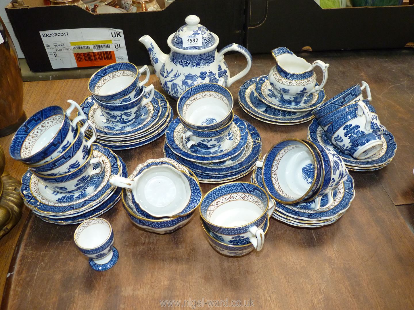 A quantity of blue and white china including 'Booths' 'Real Old Willow' cups, saucers,