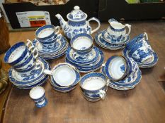 A quantity of blue and white china including 'Booths' 'Real Old Willow' cups, saucers,