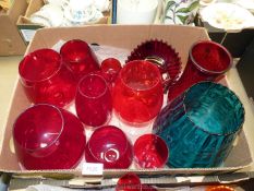 A quantity of various sized red goblets, large blue vase, etc.