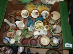 A quantity of small china ornaments including Poole seals, Wade log, Torquay pottery,