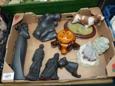 A small quantity of china including black Royal Doulton figures (loving you,) special Bond,