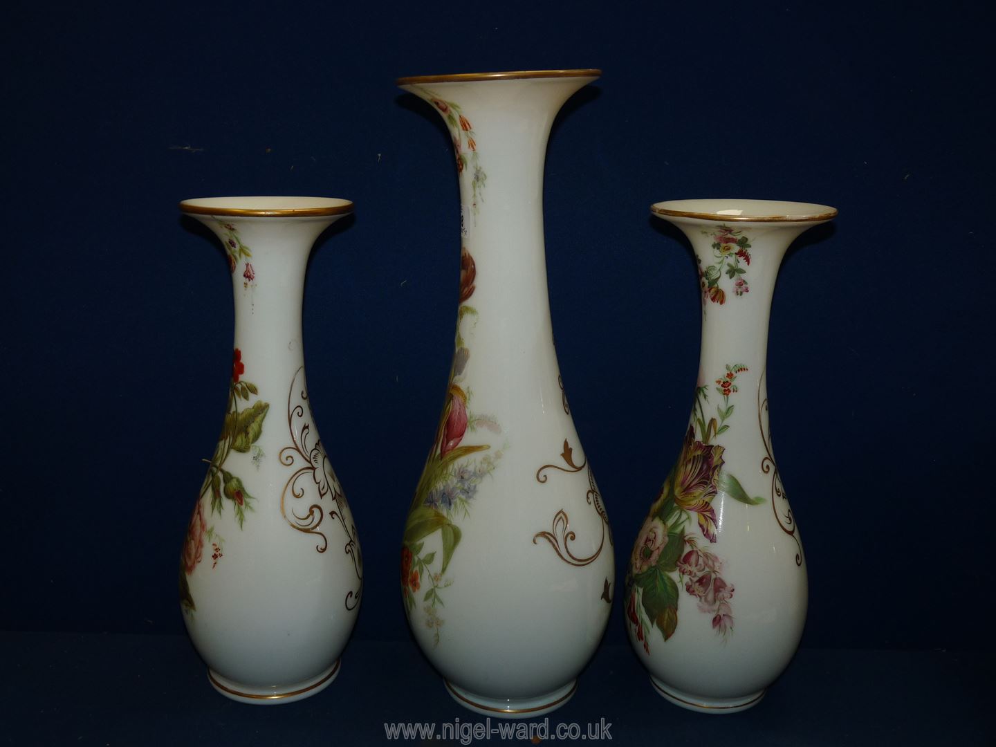 A garniture of three Victorian opaque glass Vases with hand painted flowers, - Image 3 of 17