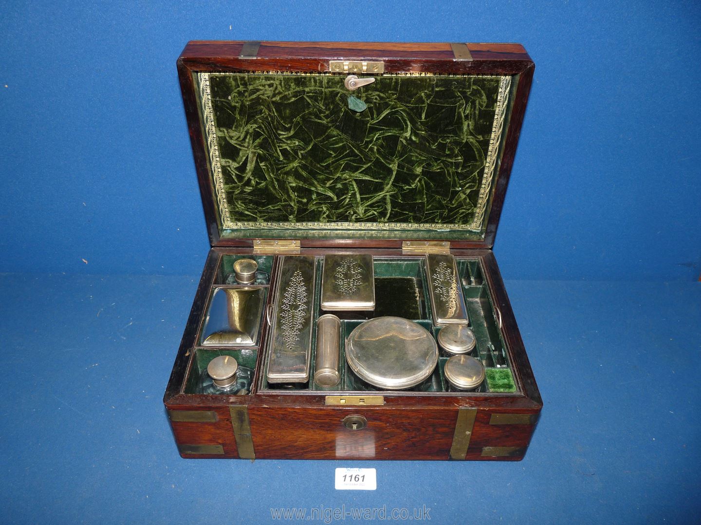 A brass bound Rosewood/Walnut cased gentleman's travelling Grooming set including glass toothpick