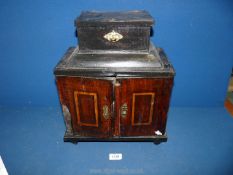 A dark wood table top Cabinet having multiple drawers and a key. 12 1/2" x 15 1/2" x 8".