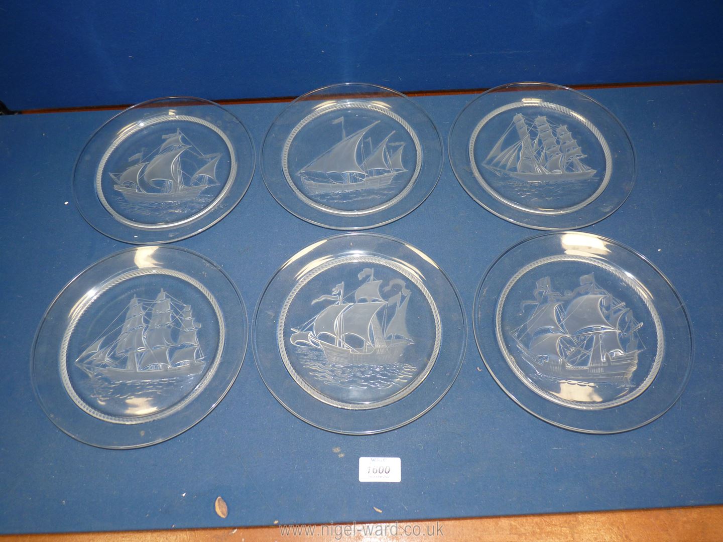 Six Lalique glass ship Plates, four being signed,