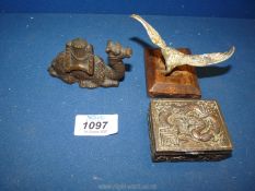 A quantity of small metal objects including a bronze model of a camel,