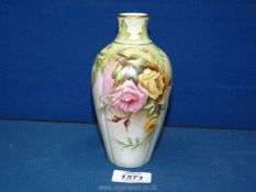 A Locke & Co 'Shrub Hill' Royal Worcester vase hand painted with roses on an ivory coloured ground,