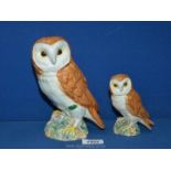 Two Beswick owls, 7½" and 4 3/4''.