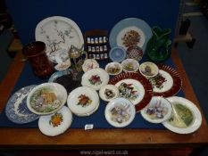 A quantity of china including a Dartmouth gurgle jug, display plates, trinket dishes, Sylvac case,