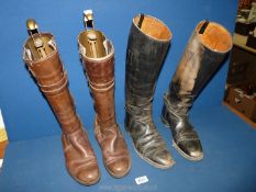 A pair of gent's riding Boots in black, size 7 1/2 and a pair of ladies riding Boots in brown,