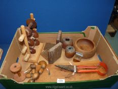 A quantity of treen to include; wool winder, clock, bookends, beads, etc.