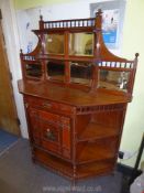 An Edwardian Satin Walnut Chiffonier,