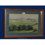 A wooden framed watercolour, title written verso 'The Skirrid from The Wigga',