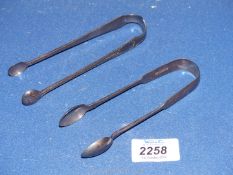 Two pairs of Silver sugar Tongs, one being Exeter 1873 maker James and Josiah Williams.