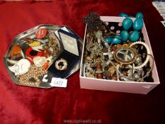 A quantity of mixed jewellery including chokers, beads and a tray of animal brooches, etc.