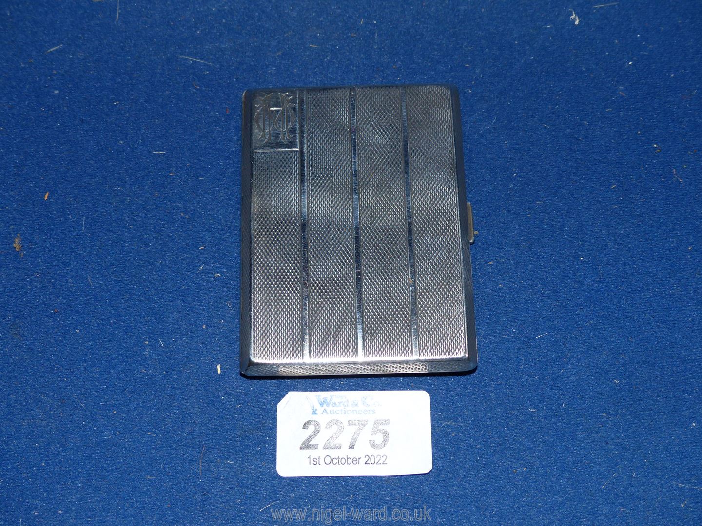 A Silver engine turned Card Case, inscribed Jim & George Sept 24th 1936, Birmingham 1932, 79 gms.