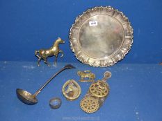 A circular epns tray, ladle, brass horse, door knocker, horse brasses, etc,