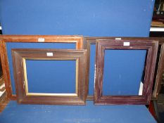 Four wooden picture Frames sizes varying from 23¼" x 19" frame down to 18½" x 16½" frame.