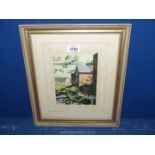A framed and mounted watercolour signed lower left Eaton 1980, titled 'Mill at Skenfrith,