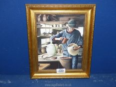 A gilt framed Oil on board depicting a gentleman Potter in his shed at work,