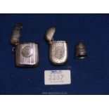 Two Silver Vesta cases,