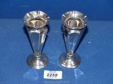 Two small Silver bud vases,