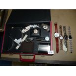 A quantity of watches and straps including Sekonda etc, in red briefcase.